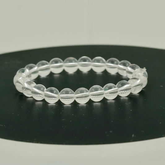 Hvid Kvarts Armbånd – 8mm Klare Krystalperler – Strækpasform Minimalistiske Smykker